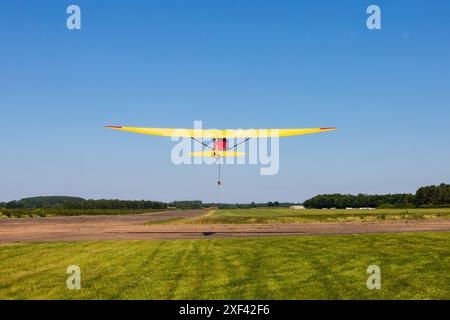 Vintage Slingsby T21 training glider taking off on a winch launch at Buckminster Gliding Club, Saltby, Lincolnshire, England Stock Photo