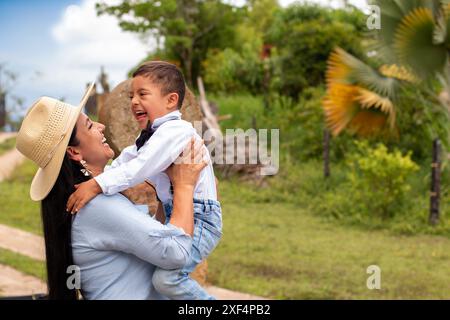 lifestyle: mother and child with down syndrome smile happily Stock Photo