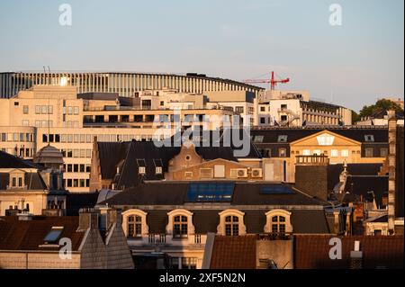 June 28, 2024 - Brussels Old Town, Belgium - High angle view over the historical city center during the golden hour Stock Photo