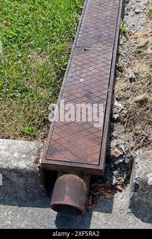 Cast iron drain for storm water runoff Stock Photo