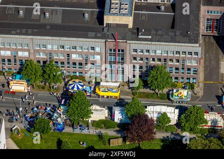 Aerial view, Himmelfahrtskirmes on the Ruhrstraße at the building of the Sparkasse Witten headquarters, carousel and stalls, Witten, Ruhr area, North Stock Photo