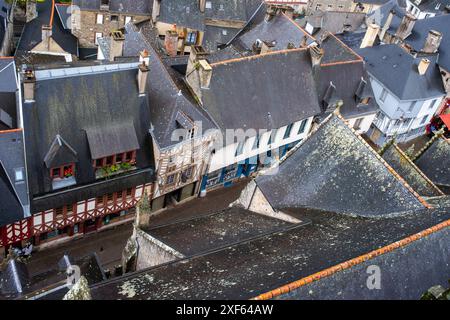 A scenic aerial view showcasing the charming historic rooftops and medieval architecture of Josselin in Brittany, France. Stock Photo