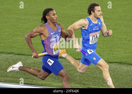 Edoardo Scotti (ITA) and Alex Haydock-Wilson (GBR) during the 4 x 400m relay men final at European Athletics Championships Roma 2024, Rome,IT Stock Photo