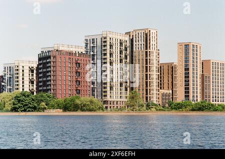 The new Blackhorse Mills apartment complex viewed from Walthamstow Wetlands nature reserve, London UK Stock Photo