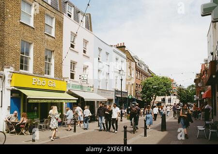 Exmouth Market, Clerkenwell, London UK, with shoppers and pedestrians Stock Photo