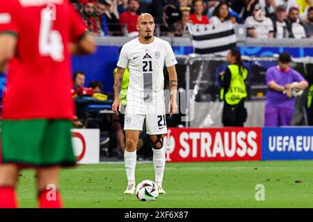 Frankfurt, Germany. 01st July, 2024. FRANKFURT, GERMANY - JULY 1: Vanja Drkusic of Slovenia during the Round of 16 - UEFA EURO 2024 match between Portugal and Slovenia at Deutsche Bank Park on July 1, 2024 in Frankfurt, Germany. (Photo by Peter Lous/BSR Agency) Credit: BSR Agency/Alamy Live News Stock Photo