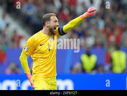 Hesse, Frankfurt, Germany. 01 July 2024, Hesse, Frankfurt/Main: Soccer: European Championship, Portugal - Slovenia, final round, round of 16, Frankfurt Arena, Slovenia's goalkeeper Jan Oblak shouts instructions to his teammates. Photo: Uwe Anspach/dpa Credit: dpa picture alliance/Alamy Live News Stock Photo