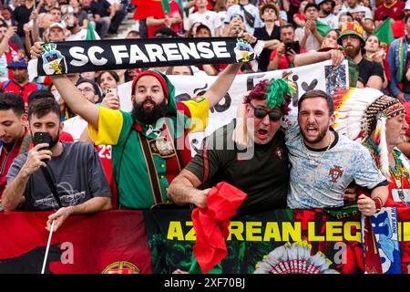 Frankfurt, Germany. 01st July, 2024. FRANKFURT, GERMANY - JULY 1: Fans of Portugal with scarves during the Round of 16 - UEFA EURO 2024 match between Portugal and Slovenia at Deutsche Bank Park on July 1, 2024 in Frankfurt, Germany. (Photo by Peter Lous/BSR Agency) Credit: BSR Agency/Alamy Live News Stock Photo