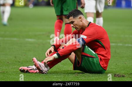 Hesse, Frankfurt, Germany. 01 July 2024, Hesse, Frankfurt/M.: UEFA Euro 2024, European Championship, Portugal - Slovenia, final round, round of 16, Frankfurt Arena, Portugal's Cristiano Ronaldo sits on the pitch. Photo: Arne Dedert/dpa Credit: dpa picture alliance/Alamy Live News Stock Photo