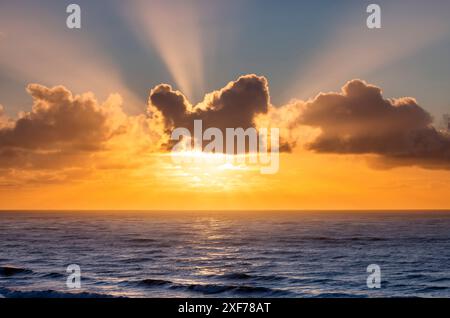 Sunset clouds over the Pacific Ocean at Cape Disappointment State Park, Washington State, USA. Stock Photo