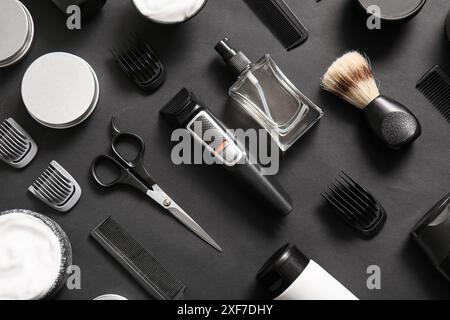 Modern trimmer and shaving accessories on black background Stock Photo