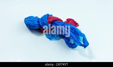 Red plastic bag and blue plastic bag isolated on white background Stock Photo