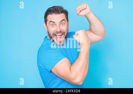 Emotional of excited man. Human reaction and emotions. Close up of excited man with facial expression. Happy and excited man doing winner gesture with Stock Photo