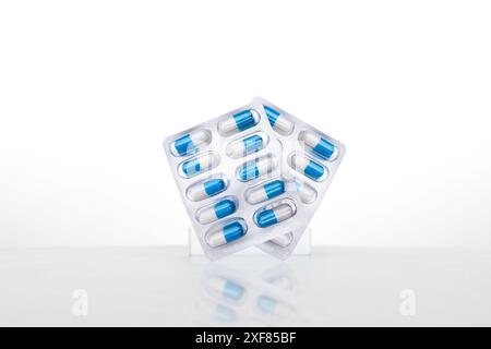 Amoxicillin capsules or antibiotic capsules pack isolated on white background , Medicine and medical concept Stock Photo