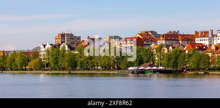 Elk, Poland - May 3, 2024: Panoramic view of Elk town with historic city center and waterfront promenade at Jezioro Elckie Lake in Mazuria lakeland Stock Photo