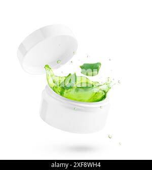 Cream jar with aloe vera gel and slices, isolated on white background. Stock Photo