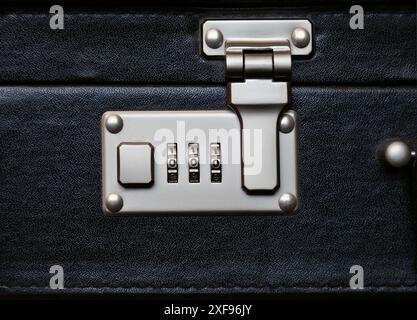 Fragment of a case with a combination lock, close-up Stock Photo