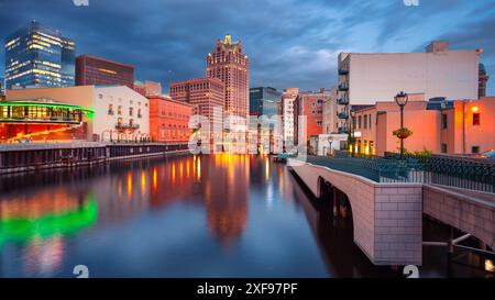 Milwaukee, Wisconsin, USA. Cityscape image of downtown Milwaukee, Wisconsin, USA with reflection of the skyline in Milwaukee River at summer sunset. Stock Photo