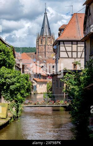 Lauter-Viertel le Schlupf with the tower of the church of St Peter and Paul, Wissembourg, Alsace, France Stock Photo