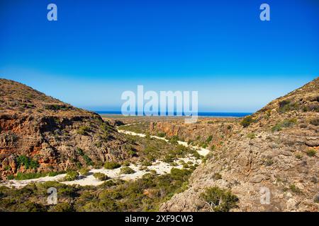 The Mandu Mandu Gorge in Cape Range National Park, Western Australia. Eroded limestone canyon, Indian Ocean in the background Stock Photo