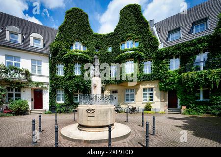 Cologne, Germany July 01 2024: the historic Pauliplatz housing estate in Cologne Braunsfeld built for the Werkbund exhibition in Cologne in 1914 Stock Photo