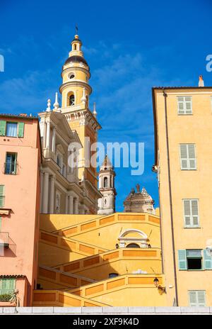 St Michael's Basilica and the zig-zg steps, part of Menton's old town Stock Photo