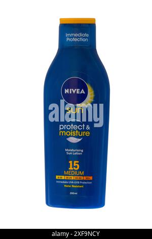 bottle of Nivea Sun protect & moisture SPF factor 15 medium sun lotion suntan lotion isolated on white background Stock Photo