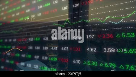 Animaton of statistical and stock market data processing against aerial view of cityscape Stock Photo