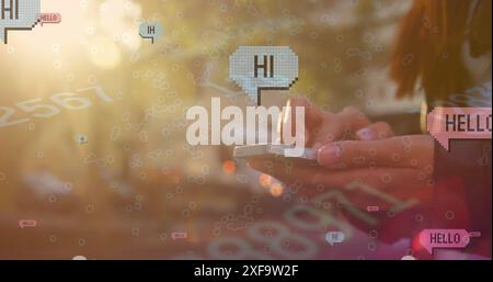 Image of hi and hello texts on speech bubbles over mid section of woman using smartphone Stock Photo