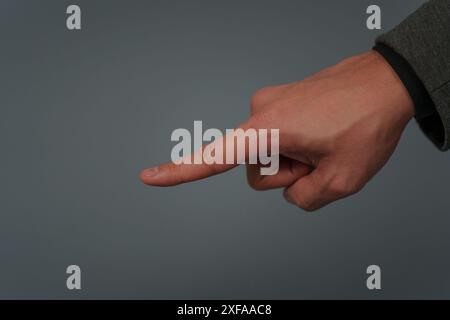 businessman in a suit pointing or fingerprint scan touching Stock Photo