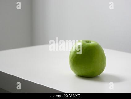 Green apple on white background. Stock Photo