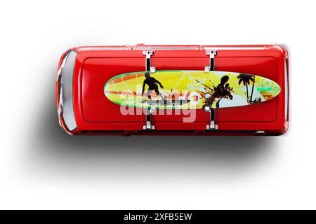 Izmir, Turkey - Jun 4 2024: Top view of a red Volkswagen Camper 1971 model toy car with a surfboard on top, photographed on a white background. Stock Photo