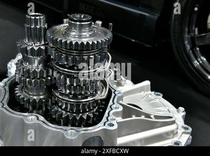 Closeup open car gearbox automatic transmission part on black background Stock Photo