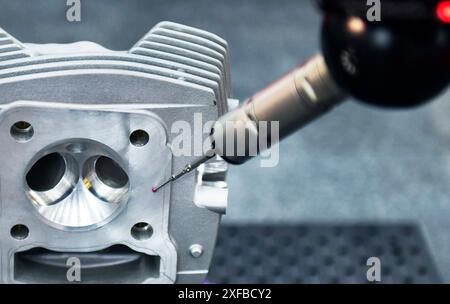 Close up automatic coordinate measurement machine (CMM) for inspection high precision part during working Stock Photo