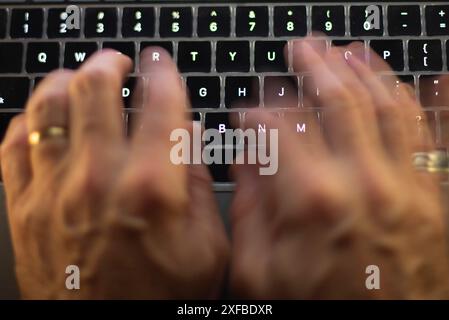 Toronto, Canada. 09th Oct, 2023. The Office of the United States Trade Representative says it will do what‚Äôs necessary to halt Canada's tax on large foreign digital services companies as American business groups demand action. A man uses a computer keyboard in Toronto in this Sunday, Oct. 9 photo illustration. Credit: The Canadian Press/Ģ����ý Live News Stock Photo