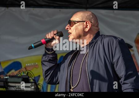 Guildford / UK - Jun 29 2024: Ex-Happy Mondays singer Shaun Ryder performs with his band Black Grape on day one of Guilfest music festival, Guildford, Stock Photo