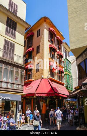 Palma de Mallorca, Spain- May 24, 2024: Beautiful street scene, medieval architecture of Palma Stock Photo