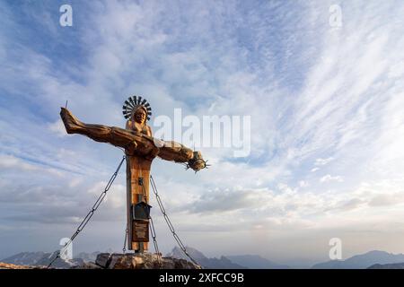 summit Schönfeldspitze in mountain range Steinernes Meer, summit cross showing Virgin Mary cradling the dead body of Jesus a wooden PietÃ  Steinernes Stock Photo