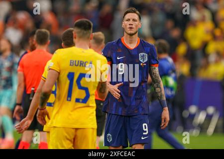 Munchen, Germany. 02nd July, 2024. MUNCHEN, GERMANY - JULY 2: Andrei Burca of Romania, George Puscas of Romania during the UEFA EURO 2024 Round of 16 match between Romania and Netherlands at Allianz Arena on July 2, 2024 in Munchen, Germany. (Photo by Andre Weening/Orange Pictures) Credit: Orange Pics BV/Alamy Live News Stock Photo