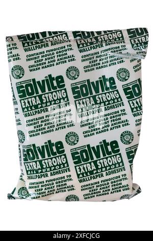 packet of opened Solvite extra strong all purpose wallpaper adhesive  isolated on white background - contains fungicide to inhibit mould growth Stock Photo