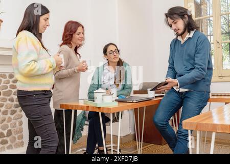Group of business people having a meeting in the office. Group of business people discussing business plan. Stock Photo