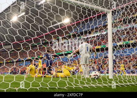 Munich, Germany. 2nd July, 2024. Romania's goalkeeper Florin Constantin Nita (front) reacts after failing to save the goal by Donyell Malen of the Netherlands during the UEFA Euro 2024 Round of 16 match between Romania and the Netherlands in Munich, Germany on July 2, 2024. Credit: Meng Dingbo/Xinhua/Alamy Live News Stock Photo