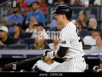 New York Yankees' Ben Rice runs to first after hitting during a ...