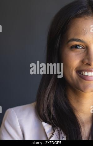 Smiling in professional attire, businesswoman posing for corporate profile Stock Photo