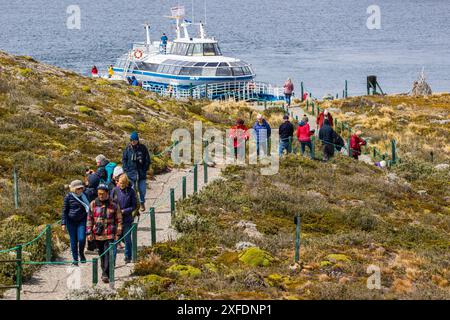 Tourists landing on Bridges Island, in the Beagle Channel, near Ushuaia, Argentina on Thursday, November 16, 2023. Photo: David Rowland /One-Image.com Stock Photo