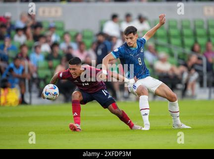 Austin, Texas, United States. 02nd July, 2024. ORLANDO GALO (14) of Costa Rica battles DAMIAN BOBADILLA (8) of Paraguay during first half in Group D CONMEBOL Copa America action with Paraguay challenging Costa Rica at Austin's Q2 Stadium on July 2, 2024. Credit: Bob Daemmrich/Alamy Live News Stock Photo