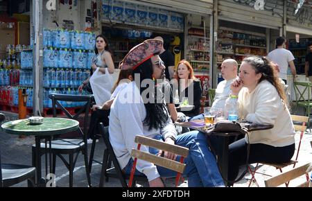 Israelis wearing costumes at the Carmel market during Purim festival. Tel-Aviv, Israel. Stock Photo