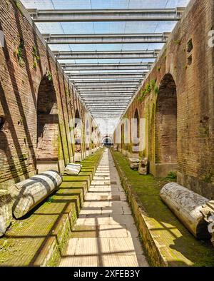 Built even before the Colosseum and probably a model for it, the amphitheatre of Capua is one the best preserved amphitheatre of the Roman times Stock Photo