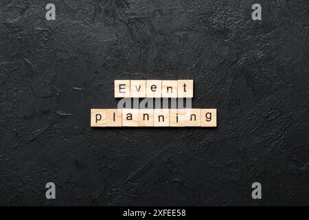 Event planning word written on wood block. Event planning text on table, concept. Stock Photo