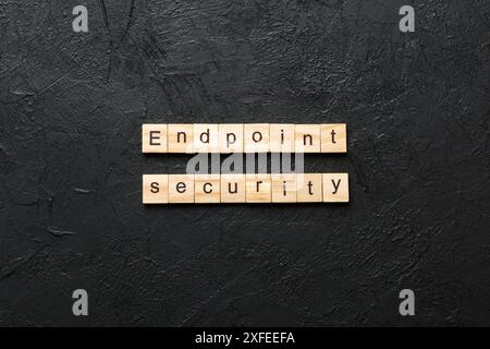endpoint security word written on wood block. endpoint security text on table, concept. Stock Photo